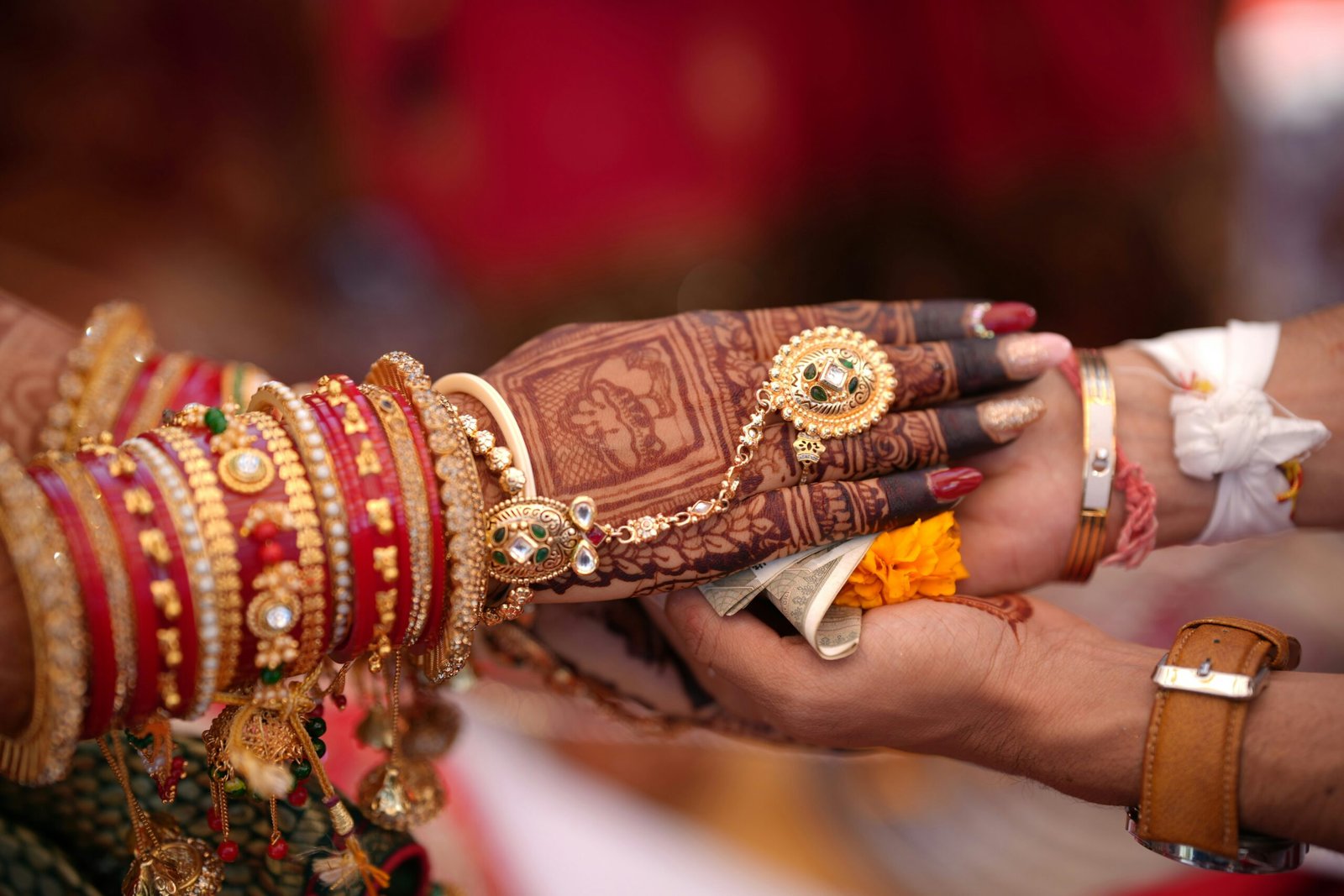 A close up of a person holding another person's hand