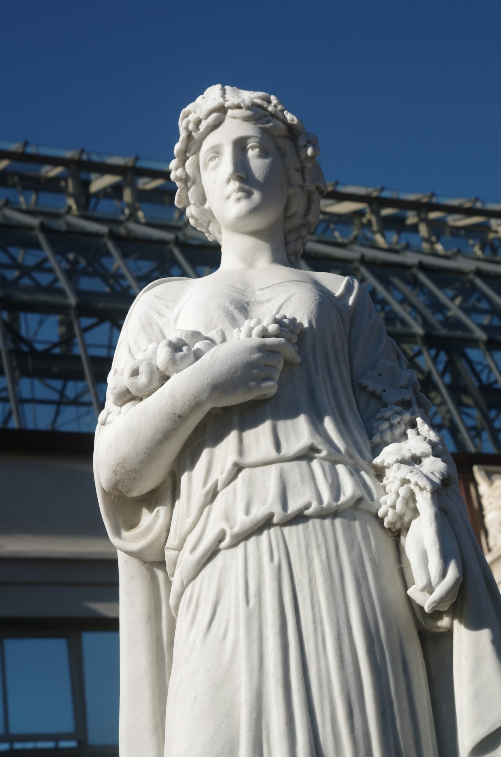 A statue of a woman with her arms crossed